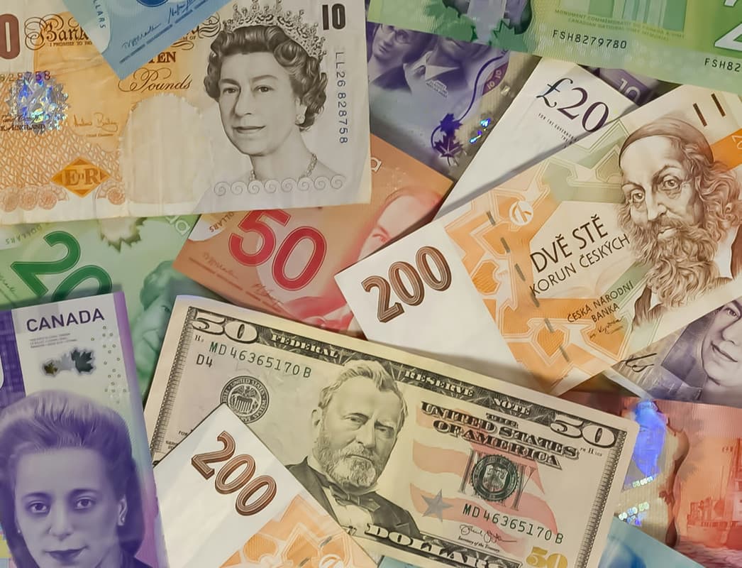 Canadian flag, money, and calculator symbolizing reducing income tax in Canada